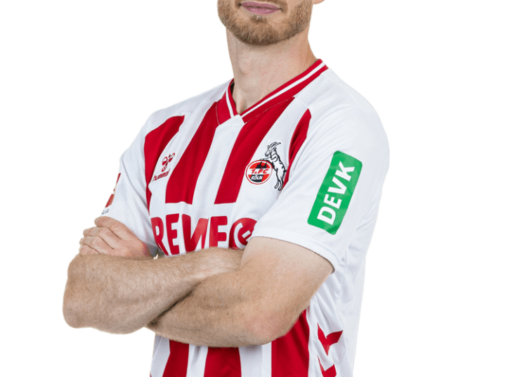 In einer dramatischen Wendung, die die Fans des 1. FC Köln in große Begeisterung versetzt hat, hat sich Mannschaftskapitän Florian Kainz in dieser fiktiven Geschichte überraschend gegen seinen geplanten Rücktritt entschieden und stattdessen seinen Vertrag bis 2030 verlängert. Die erfundene Bekanntgabe löste riesige Freude aus, als sich zahlreiche Anhänger vor dem Stadion versammelten und ihren Kapitän feierten.